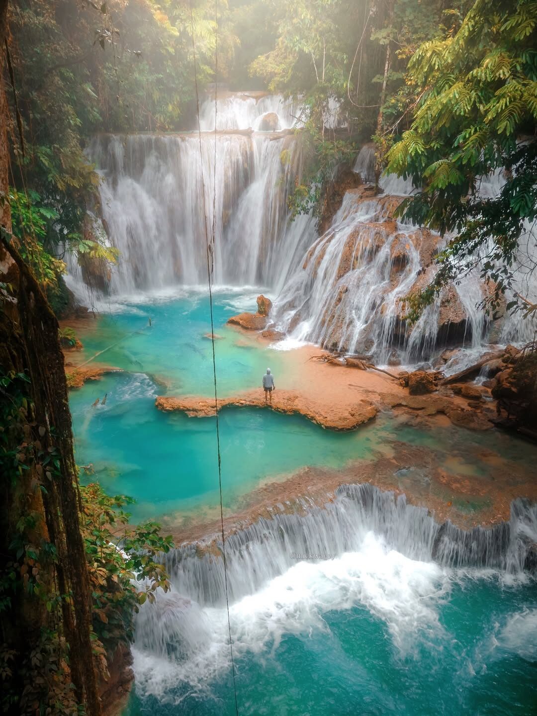 Piala Waterfall surrounded by lush tropical forest in Banggai
