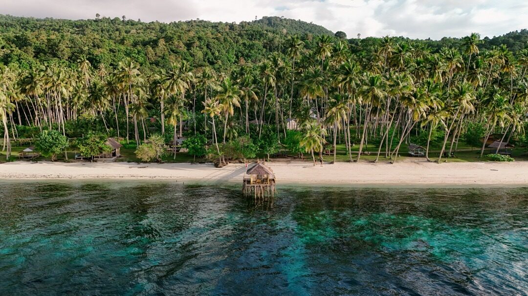Poganda Beach - soft sand and quiet blue water in Banggai